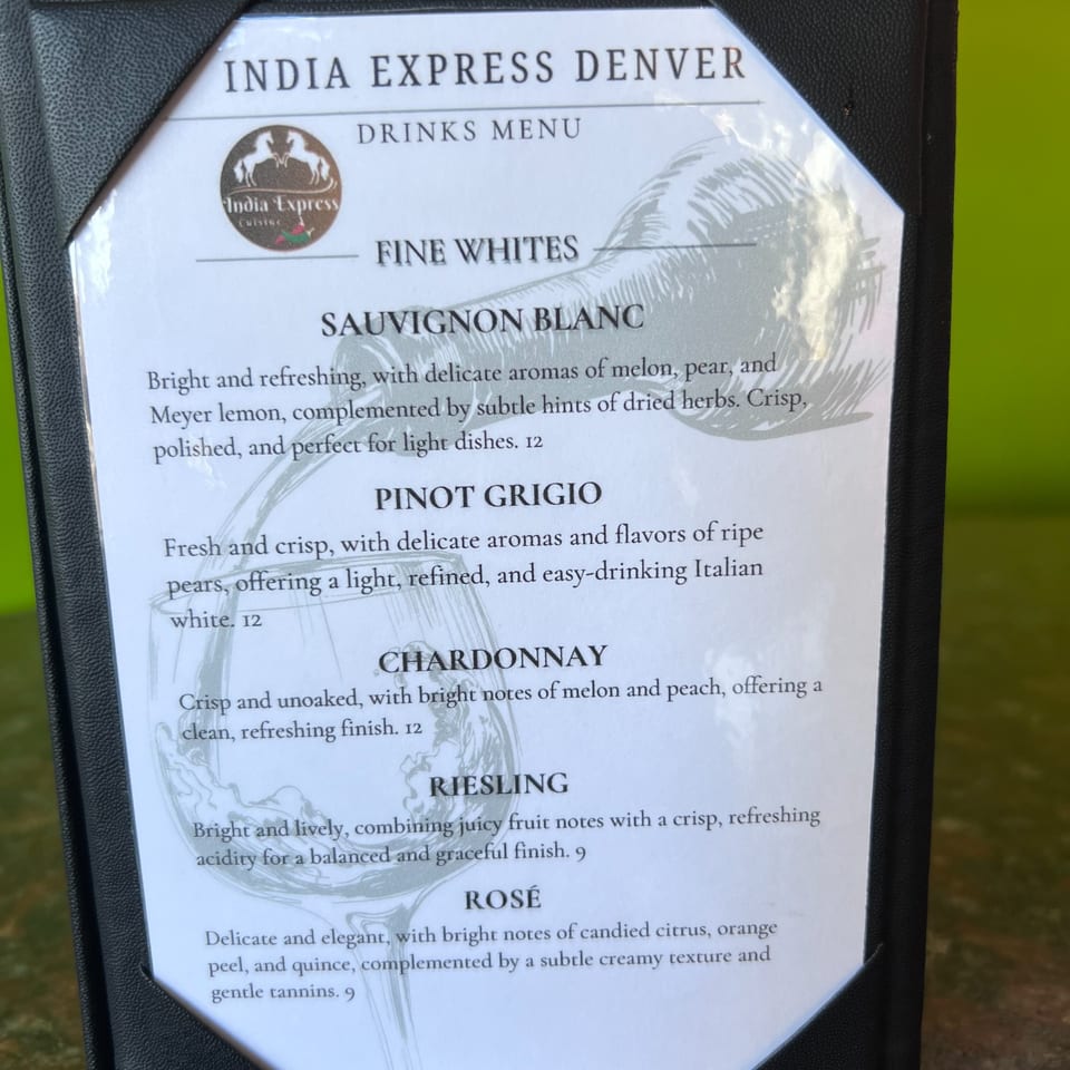 India Express Denver's drinks menu, featuring a selection of fine white wines and rosé.